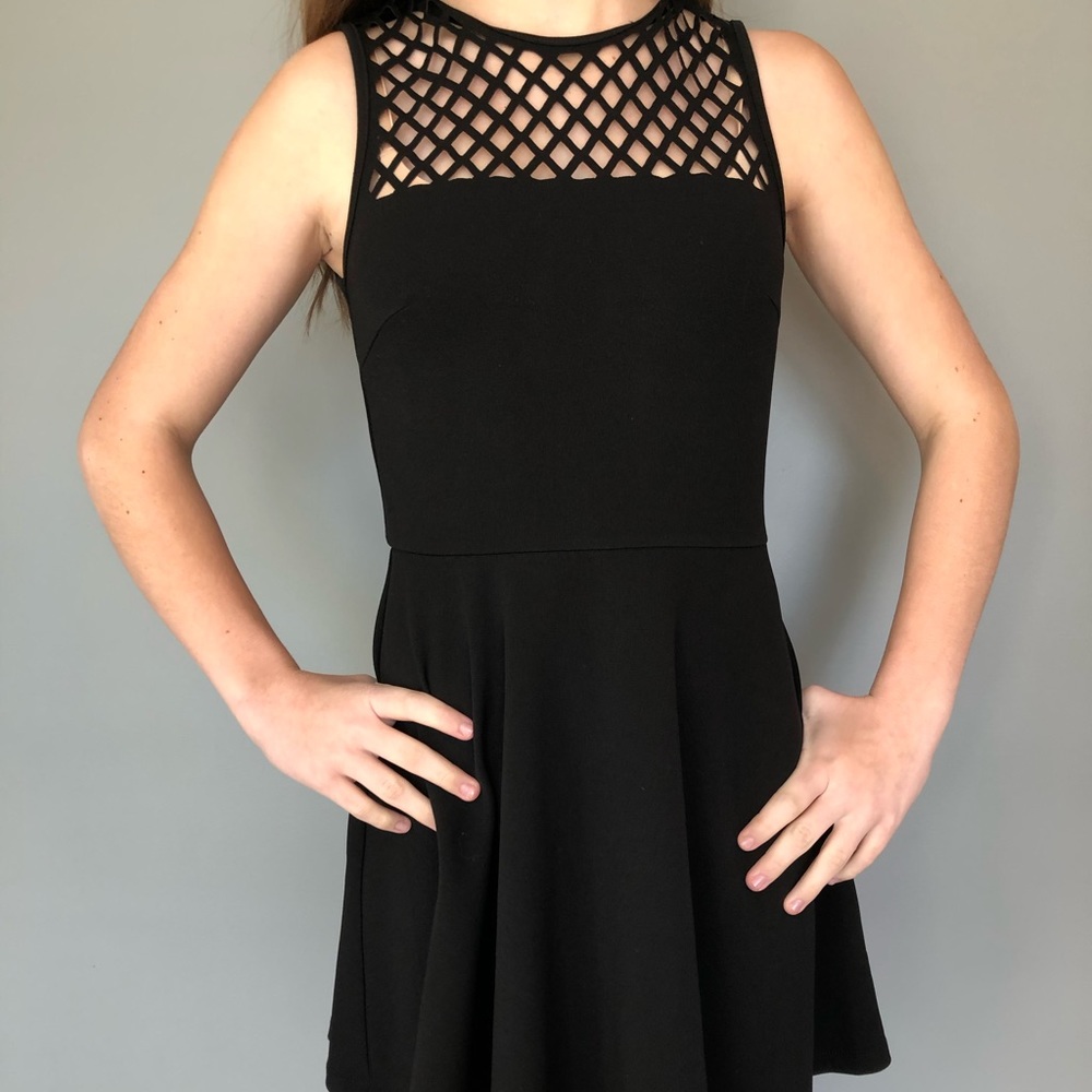 black dress with fishnet top